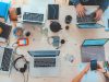 How USA-Based UI/UX Designers are Redefining Digital Interactions laptops on the table